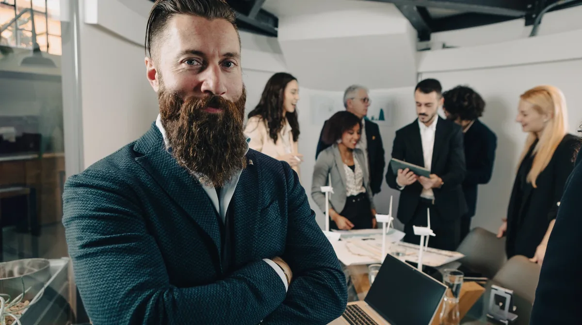 A professional with a notebook in a shared workplace