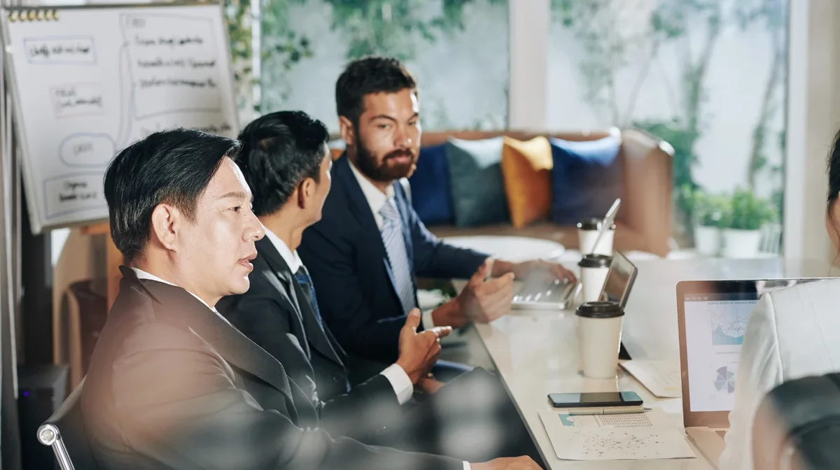 A team reviewing information together in an office
