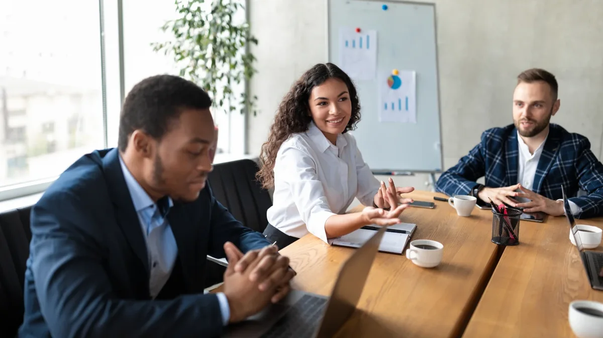 A team discussing work in a conference room