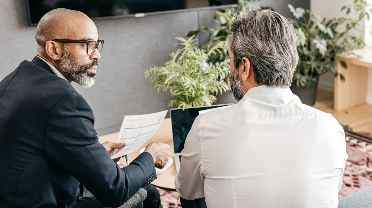 Two colleagues having a one-to-one conversation